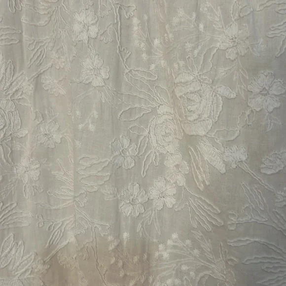 Rafaela D’Angelo. White boho or beach maxi dress.